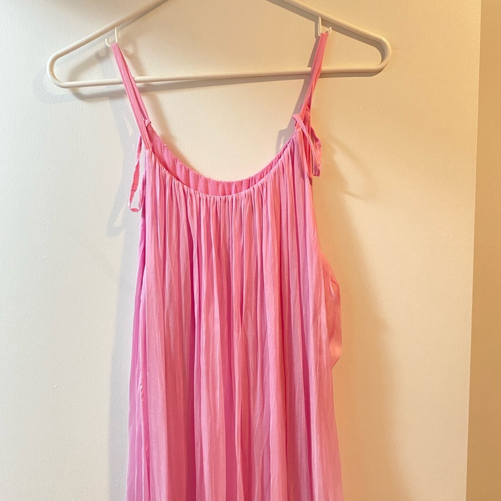 Long flowy pink dress.